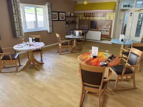Communal dining room at Red Rose Care Home
