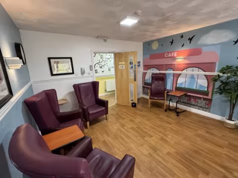 Cafe-themed communal area at White Rose Care Centre